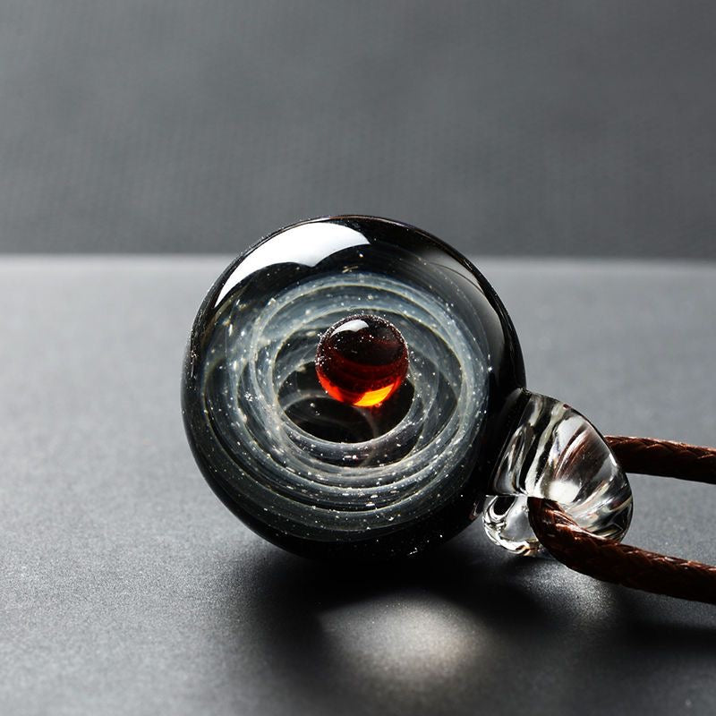Inner Orbit Glass Necklace — Hand-shaped Celestial Pendant