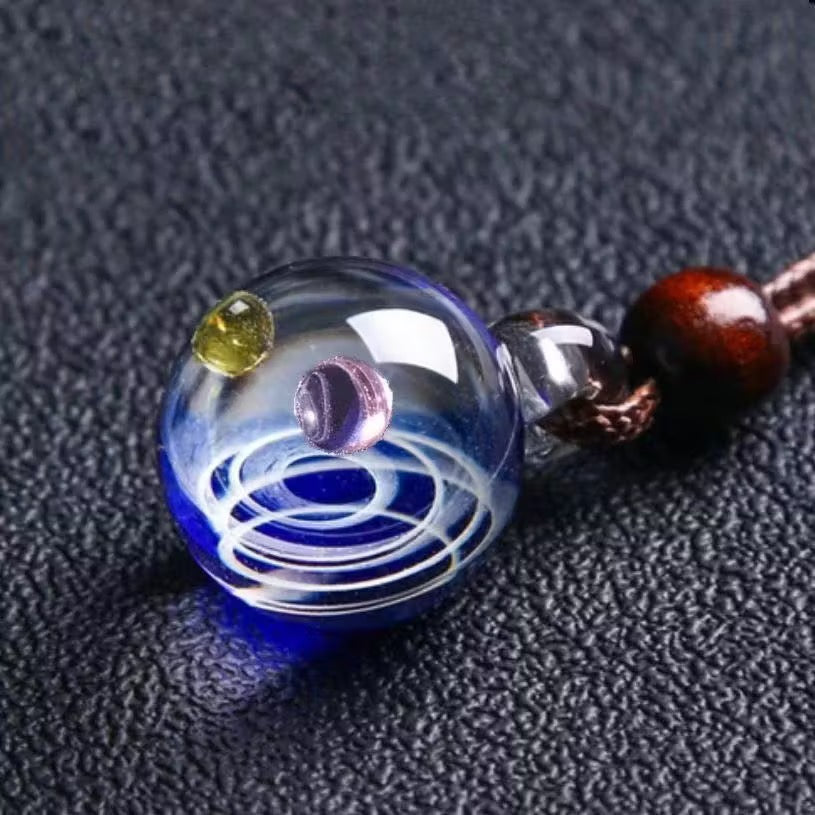 Inner Orbit Glass Necklace — Hand-shaped Celestial Pendant