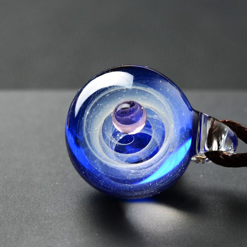 Inner Orbit Glass Necklace — Hand-shaped Celestial Pendant